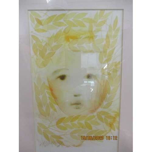 71 - Murray -a pair of framed watercolours depicting children's faces in a yellow wash, mounted and frame... 