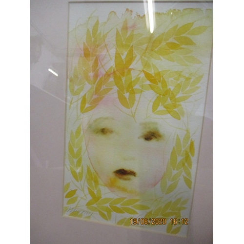 71 - Murray -a pair of framed watercolours depicting children's faces in a yellow wash, mounted and frame... 