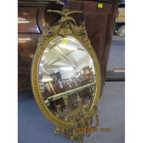 80 - A late 19th century French gilt Girondole wall mirror with candle sconces having a horn and floral d... 