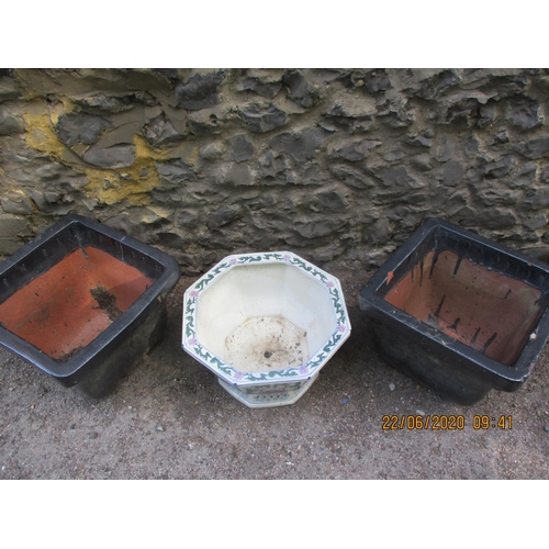 94 - A pair of black painted, square form terracotta pots and an oriental planter
Location: FOYER