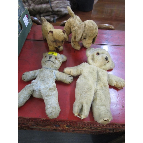 87 - An early soft toy of a dog and a cat and two later soft toy teddy bears
Location: 6:4