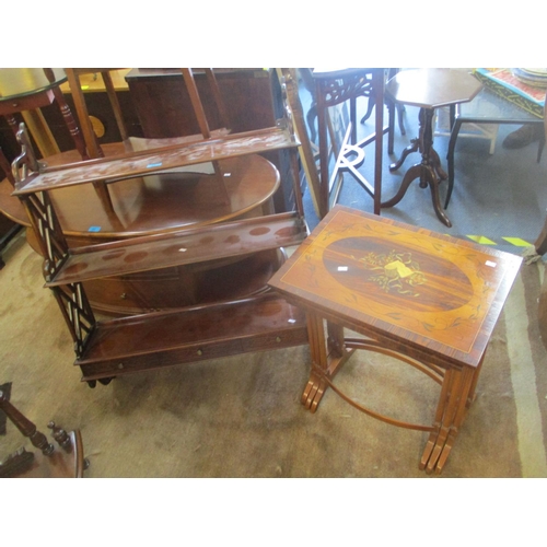 64 - A reproduction mahogany three tier wall hanging shelf, together with a nest of three inlaid tables
L... 