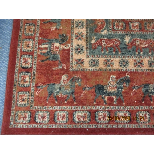 99 - A modern red ground rug having multiguard borders, one border having a frieze of horses, 53