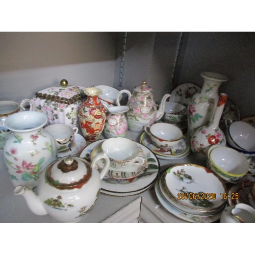 106 - A quantity of 20th century oriental ceramics to include a small Satsuma vase and eggshell teacups
Lo... 