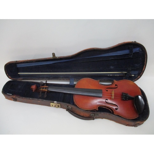296 - A late 19th century violin with a N Audinot label, 1899 No 695 in pencil with a two piece back and i...