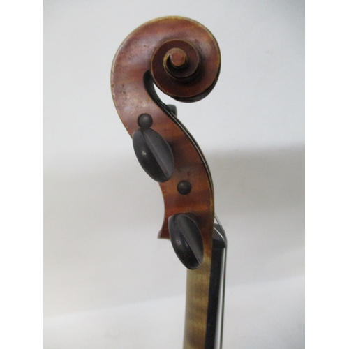 296 - A late 19th century violin with a N Audinot label, 1899 No 695 in pencil with a two piece back and i... 