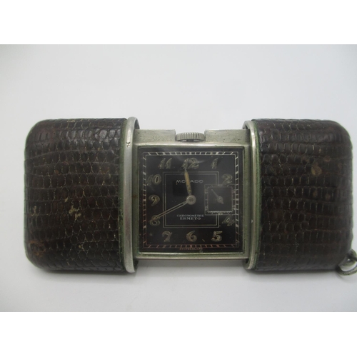 20 - An Art Deco Movado Ermeto chronometer manual wind purse watch having a black dial with subsidary sec... 