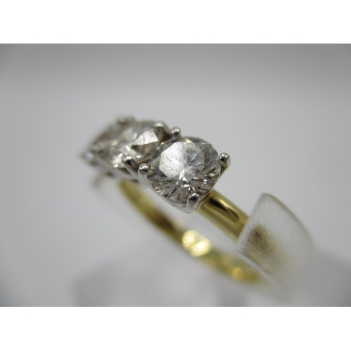 221 - An 18ct gold three stone diamond ring approximately 1.50ct, total size L/M, 4.2g