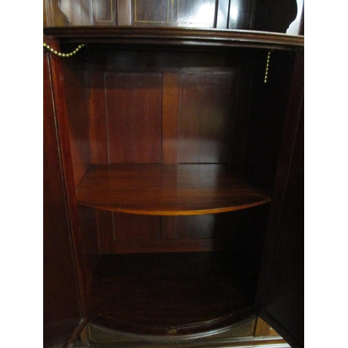 231 - An Edwardian Taylor and Hobson mahogany and extensive marquetry inlaid display cabinet with a centra... 