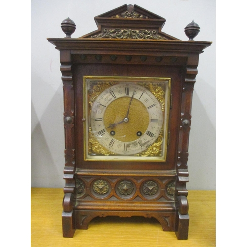 62 - A late 19th/early 20th century German bracket clock with wall bracket. The walnut case having gilt m... 