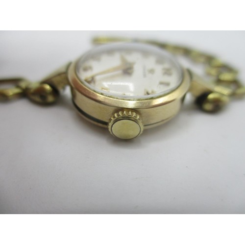 57 - An Omega manual wind, gold plated ladies wristwatch, circa 1956 having a white dial with Arabic nume... 