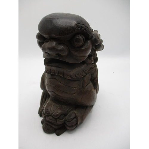 36 - A 20th century Chinese carved wooden foo dogs with a ball, 7