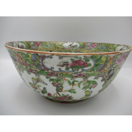 5 - A 19th century Chinese Canton bowl with flared sides, decorated to the interior and exterior with pa... 