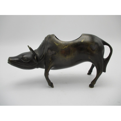 48 - A 19th century Chinese bronze incense burner, fashioned as a Tao Philosopher Lazo riding a water buf... 