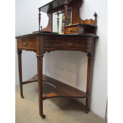 282 - A late 19th century Amboyna and Marquetry writing table with scrolled leaf, ribbon and urn ornament,... 