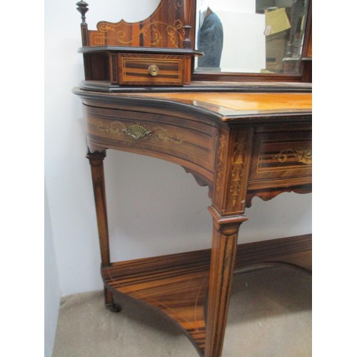 282 - A late 19th century Amboyna and Marquetry writing table with scrolled leaf, ribbon and urn ornament,... 