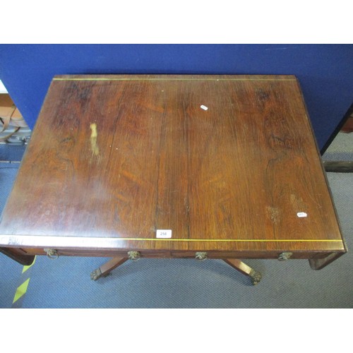 258 - A Regency brass inlaid rosewood sofa table with twin fall flaps and a reeded edge, over a pair of dr... 