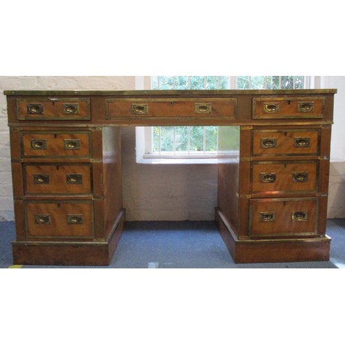 263 - A late 19th/early 20th century satinwood military style, twin pedestal desk with brass banding to th... 