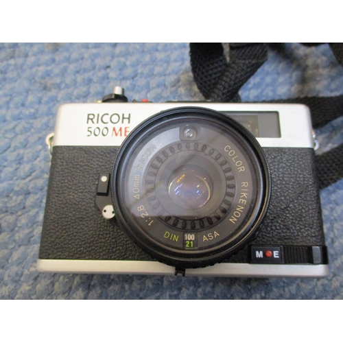 77 - A Contax 167MT Camera, a boxed digital Fujifilm Fine Pix E510 camera, boxed, a Praktica Electronic B... 