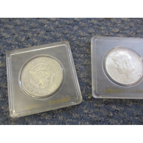 79 - A group of American coins to include 1964 Kennedy half dollars and a 1971 uncirculated D Eisenhower ... 