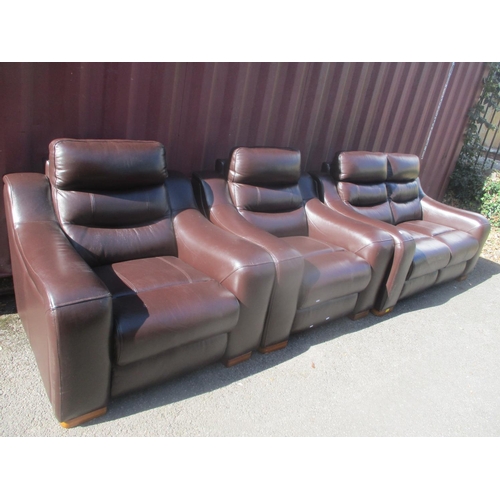 134 - A modern brown leather two seater sofa and a pair of matching armchairs
Location: C