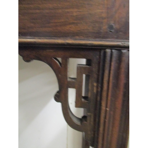 184 - A George III Chippendale style mahogany tea/card table with a double foldover top, on square moulded... 