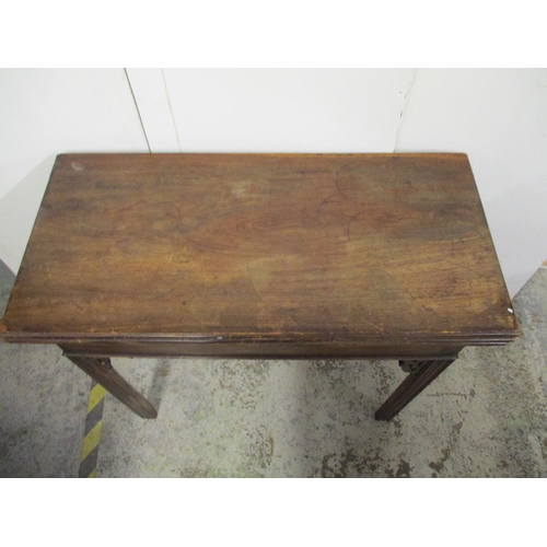 184 - A George III Chippendale style mahogany tea/card table with a double foldover top, on square moulded... 