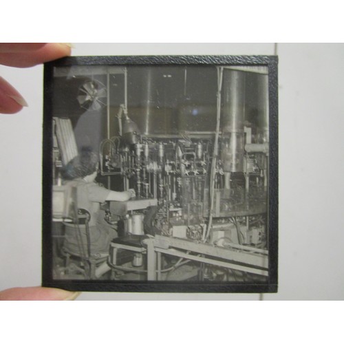 185 - A group of twenty three lantern slides depicting scenes of an electrical factory manufacturers, in a... 