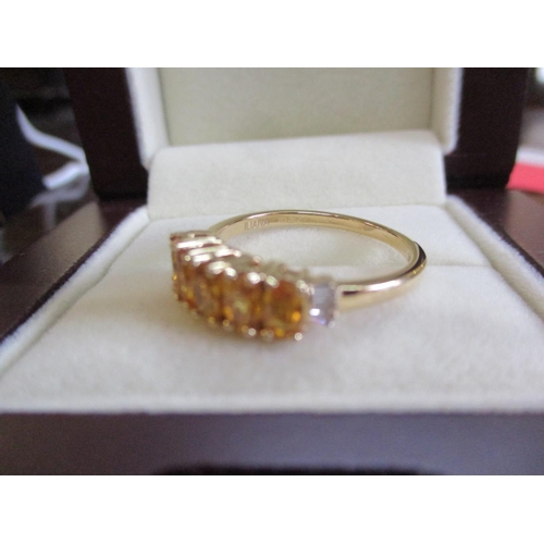 16 - An 18ct yellow gold and yellow sapphire and diamond ring
Location: CAB