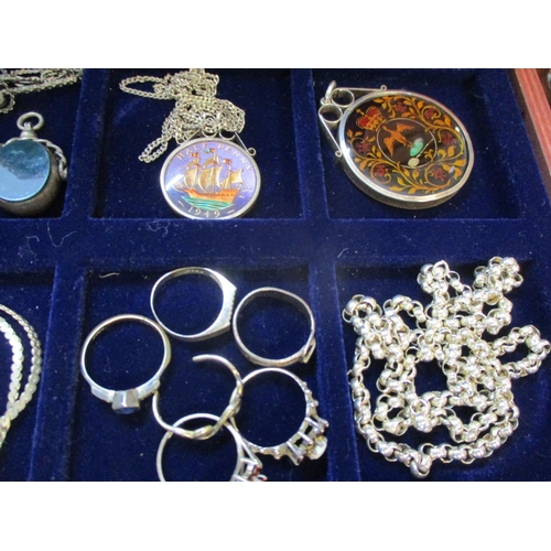 252 - Mille Fleurie pendants, coins pendants, mixed silver items stamped 925 and white metal items housed ... 