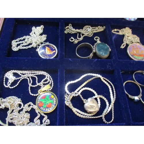 252 - Mille Fleurie pendants, coins pendants, mixed silver items stamped 925 and white metal items housed ... 