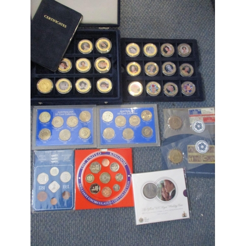 254 - A Queen Elizabeth II commemorative coin collection to include a 2013 Coronation Jubilee piedfort and... 