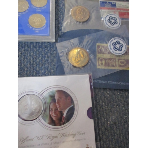 254 - A Queen Elizabeth II commemorative coin collection to include a 2013 Coronation Jubilee piedfort and... 