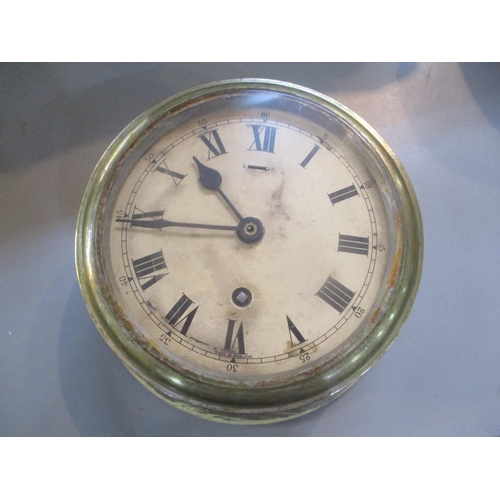100 - An early 20th century brass cased ship's clock 20 1/2 cm d
Location: LAM