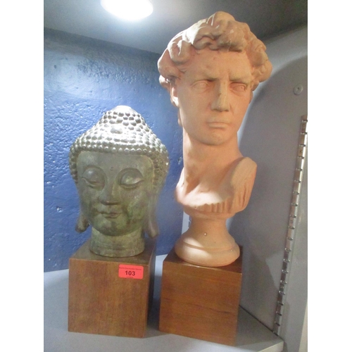 103 - A 20th century bronze Buddha bust 24 cm high, together with a terracotta bust of David 37 cm high on... 