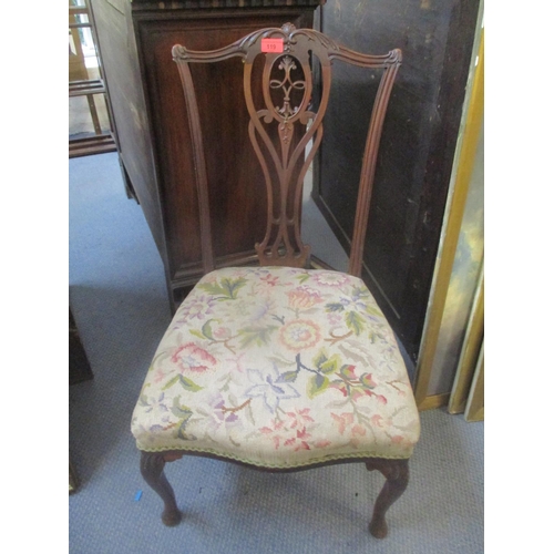 119 - An early 20th century mahogany splat back nursing chair with a tapestry seat
Location: C