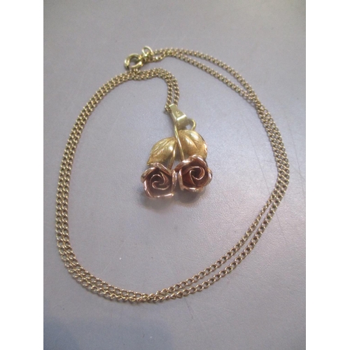 120 - A 9ct gold chain and rose pendant 4.30g
Location: CAB