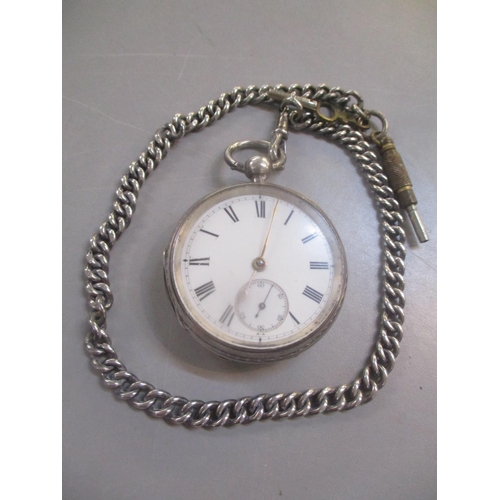121 - A Victorian silver cased pocket watch and chain
Location: CAB