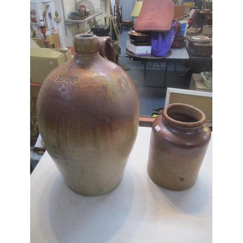 164 - A 18/19th century two tone brown glazed flagon and a later jar
Location: LAF
