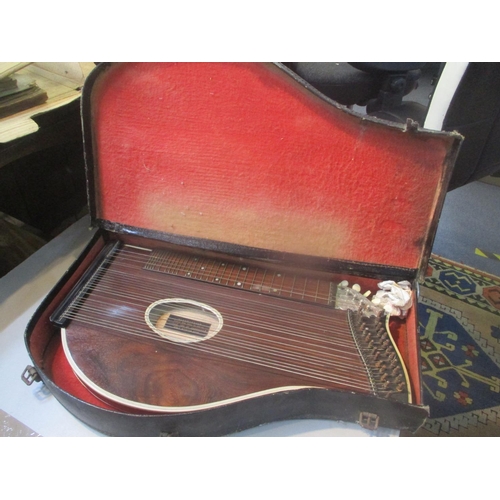 178 - An early 20th century cased concert zither with label to the inside 'Herr Wilhelm Linde'
Location: F... 