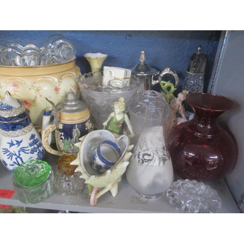 187 - A mixed lot to include a silver plated, topped claret jug, Hummel figures, Capodimonte figure, two s... 