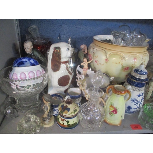 187 - A mixed lot to include a silver plated, topped claret jug, Hummel figures, Capodimonte figure, two s... 