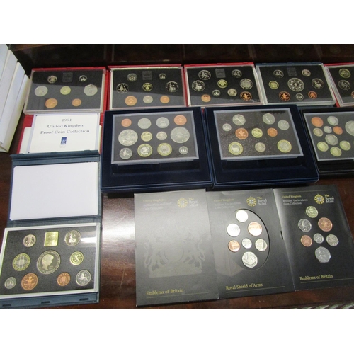 213 - A collection of annual proof coin sets 1989-1994 and 1998, along with a Diamond Jubilee Executive Pr... 