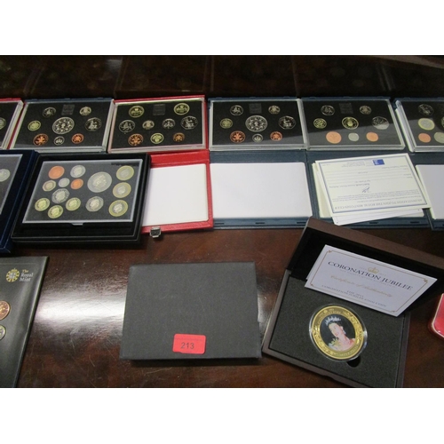 213 - A collection of annual proof coin sets 1989-1994 and 1998, along with a Diamond Jubilee Executive Pr... 