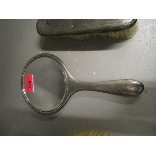 215 - A silver clad three piece dressing table brush and mirror set, Birmingham hallmarks
Location: BR