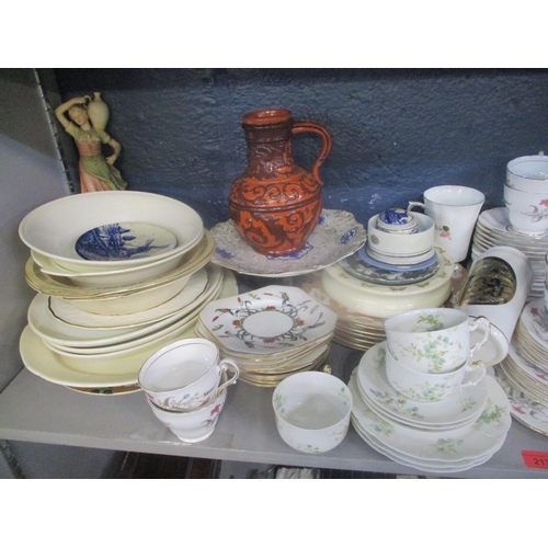 217 - A mixed lot to include a Royal Dux figure, French Haviland part tea set, trinket box, mixed tea sets... 