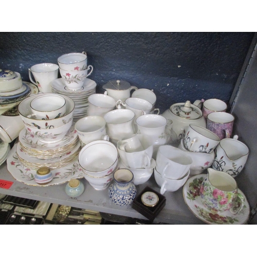 217 - A mixed lot to include a Royal Dux figure, French Haviland part tea set, trinket box, mixed tea sets... 