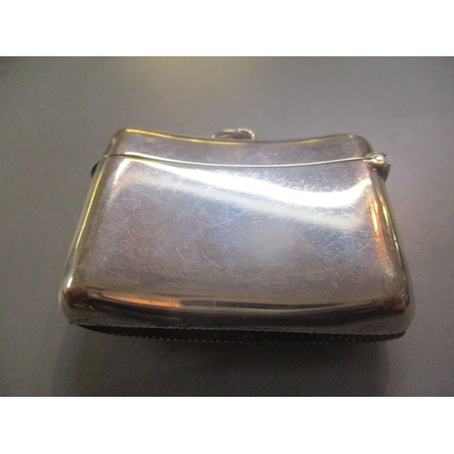 232 - An early 20th century silver vesta case with monogram to the front
Location: CAB