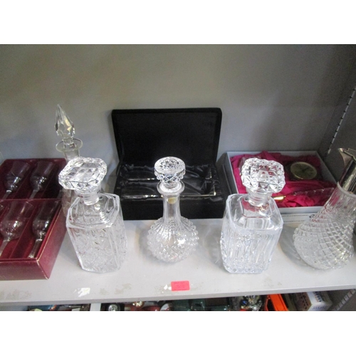 302 - A selection of table glass to include six decanters and stoppers, boxed set of drinking glasses and ... 