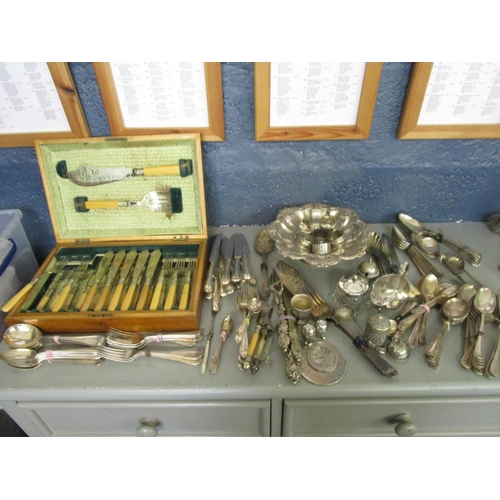 35 - A quantity of silver plated items to include a cased set of fish servers and forks
Location: 9.3